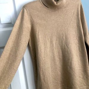 Classy Gold turtleneck. Never worn.